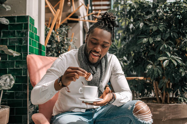 istock Handsome diverse black man in a dutch cafe 1488353185