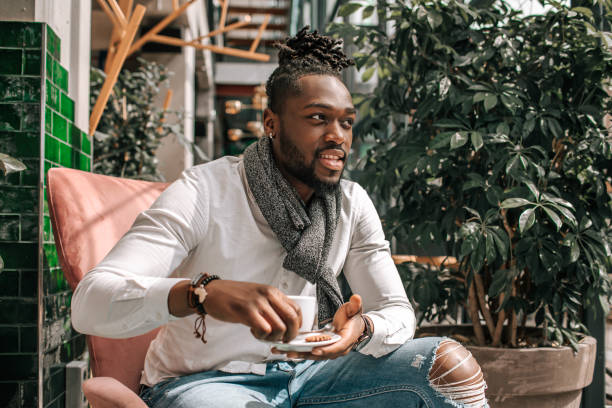 istock Handsome diverse black man in a dutch cafe 1488353188