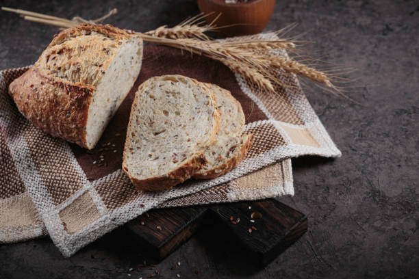 istock Sliced fresh baked whole grain bread with flax seeds 1488354349