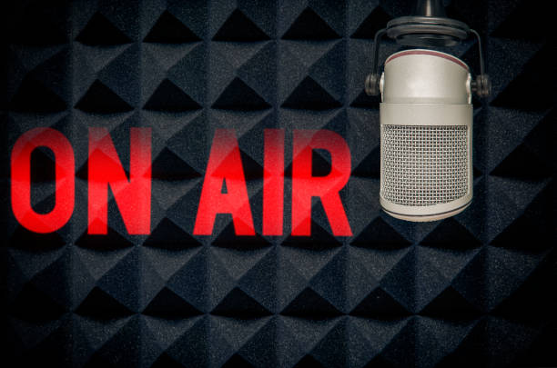 istock Professional microphone and on air sign 1488355558
