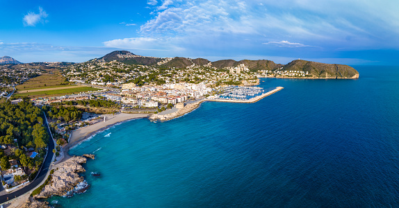 Moraira beach in Teulada Drone aerial skyline in blue Mediterranean sea of Alicante Spain in Marina Alta of Costa Blanca