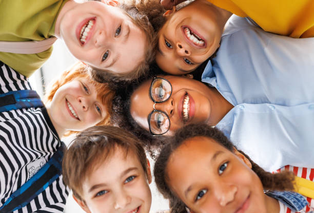 istock Portrait of teacher and students during lesson 1488368587