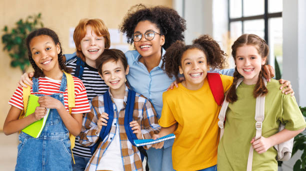 istock Portrait of teacher and students during lesson 1488368620