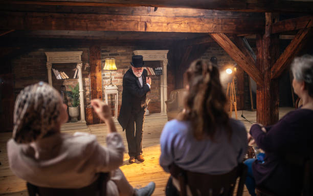 istock Senior man actor performing on stage for a an audience 1488369098