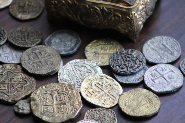 istock Spanish Coins Laid Out On Display. 1488370353