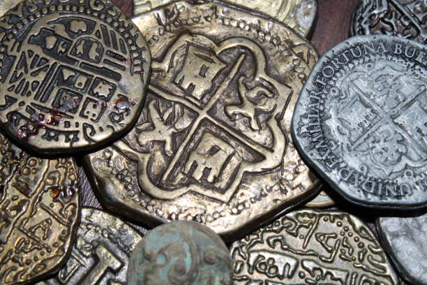 istock Spanish Coins Laid Out On Display. 1488370374