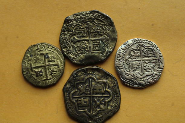 istock Spanish Coins Laid Out On Display. 1488370421