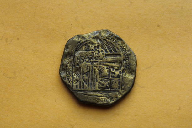 istock Spanish Coins Laid Out On Display. 1488370437