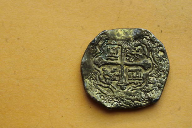 istock Spanish Coins Laid Out On Display. 1488370449