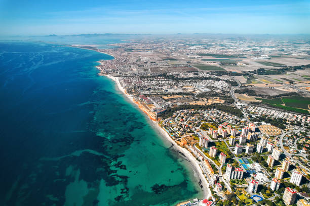 istock Dehesa de Campoamor seaside and townscape view from above. Spain 1488370475