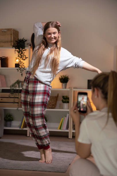istock Woman recording social media challenge 1488372056