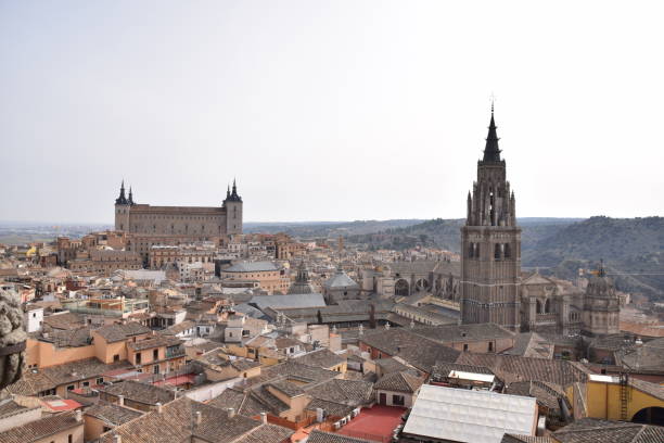 istock The Alcazar and Cathedral in Toledo, Spain 1488372255