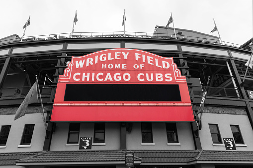 Chicago - Circa April 2023: Wrigley Field Home of Chicago Cubs in red with copy space. Wrigley Field has been home to the Cubs since 1916.