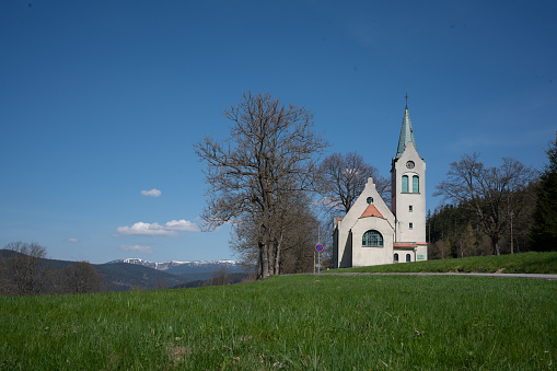 Church in the mountains on a meadow