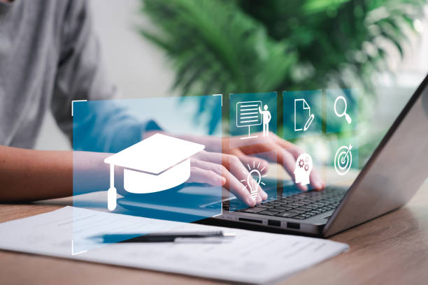 istock E-learning education, internet lessons online and business technology concept, Women use laptop working with education icon on virtual screens for online learning and search for knowledge and ideas 1488377481
