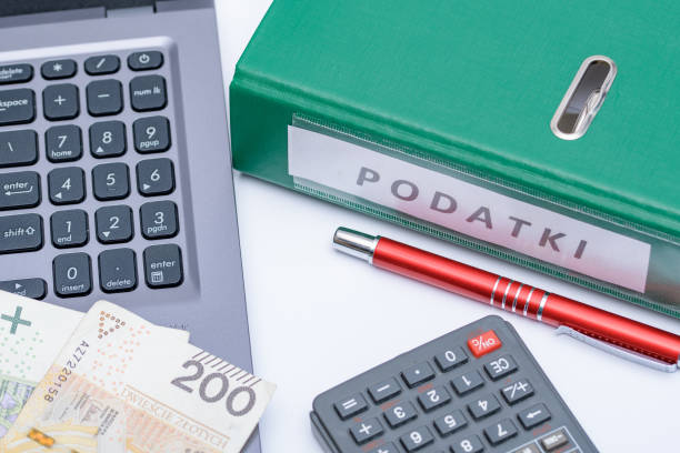 istock Office binder, laptop, Polish cash and calculator 1488379647