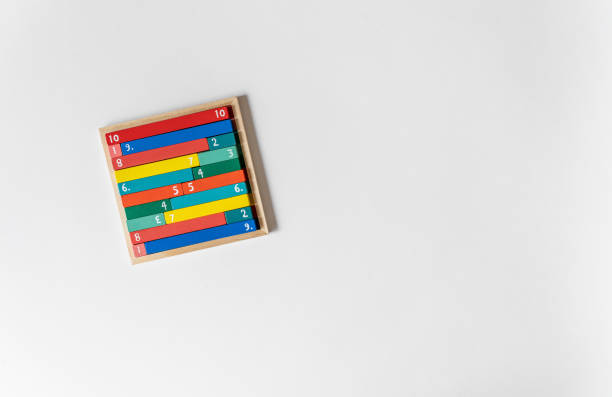 istock Math fractions on white background. Interesting math for kids. Education, back to school concept. Geometry and mathematics materials. Close up 1488383513