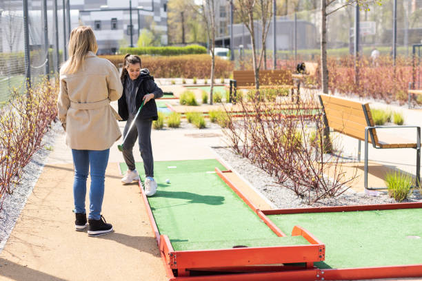 istock Family Time Playing Mini-Golf In The Summer 1488389460