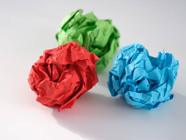 istock Colorful crumpled paper balls on a gray background 1488389794