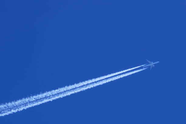 istock contrail from an airplane in the blue sky 1488395463