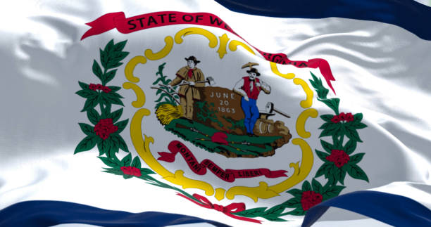 West Virginia state flag waving on the wind on a clear day West Virginia state flag waving on the wind. White field, blue stripe, state coat of arms, Rhododendron maximum, and red ribbon. 3d illustration render. Fluttering fabric. west virginia us state stock pictures, royalty-free photos & images