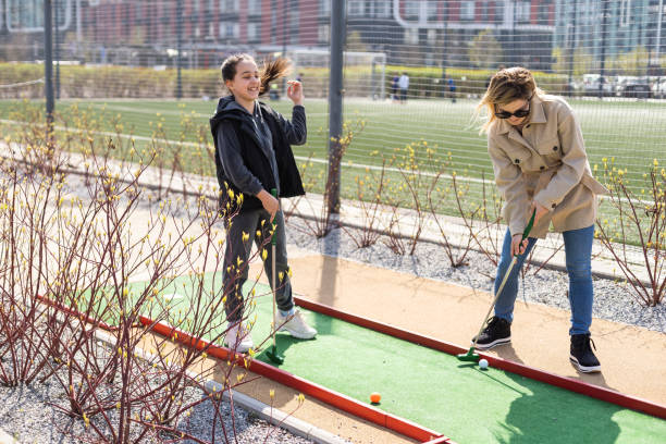 istock Family Time Playing Mini-Golf In The Summer 1488397380