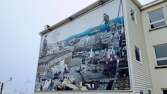 Saint Pierre and Miquelon, France – June 28, 2022: A mural painted on the side of a building. Saint Pierre and Miquelon.