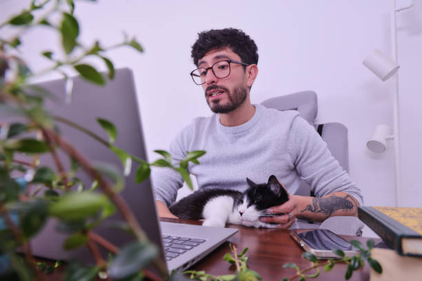istock middle-aged man chatting at home 1488401229