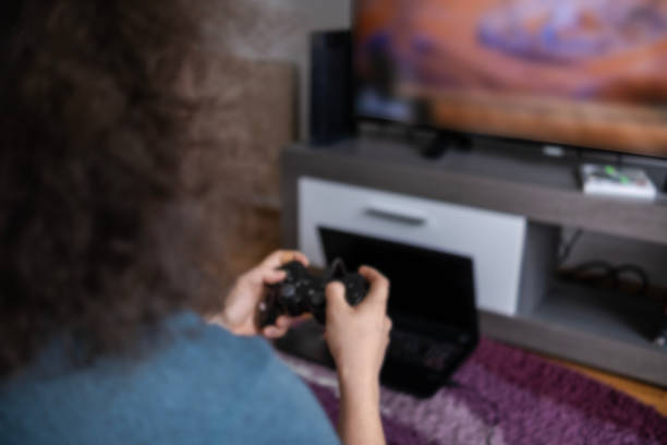 istock Focusing hard to beat this level in a video game 1488402285