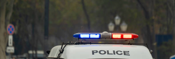 istock Police car driving through the city 1488406385