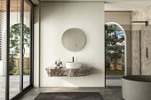 modernes-badezimmer-mit-einer-naturstein-arbeitsplatte-mit-integriertem-waschbecken-einem.jpg?b=1&s=170x170&k=20&c=RuHslZBax948eZgaybe5o2XntgFPPYXUzzsBLepWAWc=