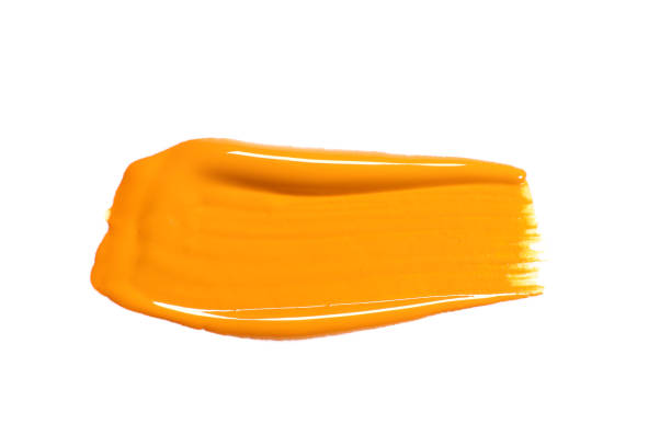 stroke of yellow color paint isolated on white - brush stroke paint stroking isolated imagens e fotografias de stock