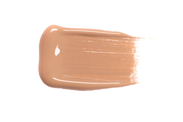 istock Smear of beige foundation isolated on white 1488412742