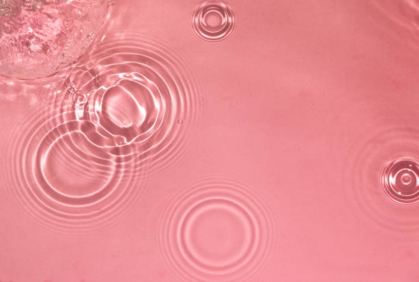 istock pink water drop ripple, creative art design 1488414850