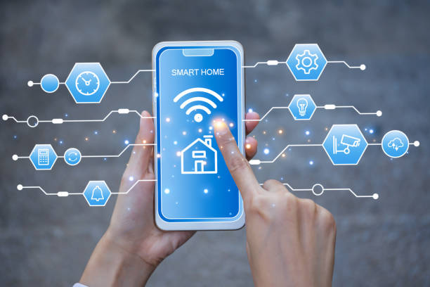 istock Hands using smart phone for mobile phone with smart home app 1488416822