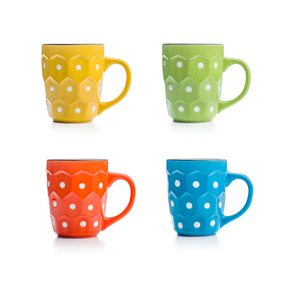 The polka dot mugs isolated on the white background.