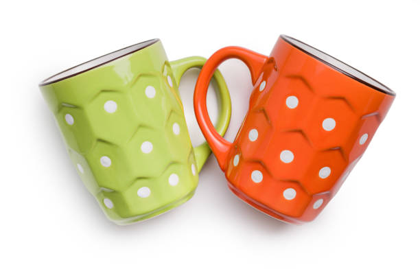 The polka dot mugs isolated on the white background.