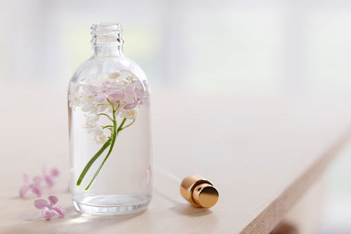Bottle with flowers in water