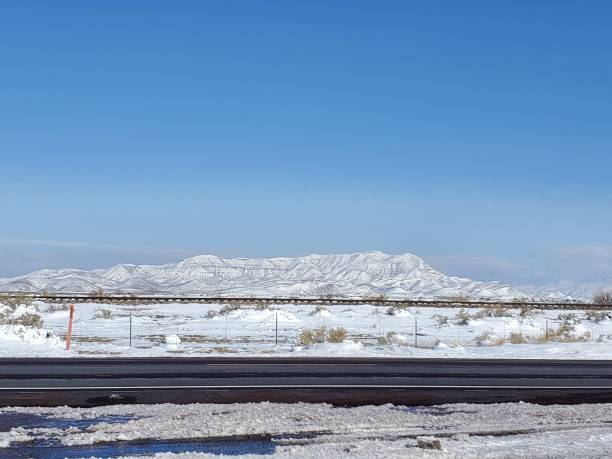 istock Snowy mountain and railroad 1488423324