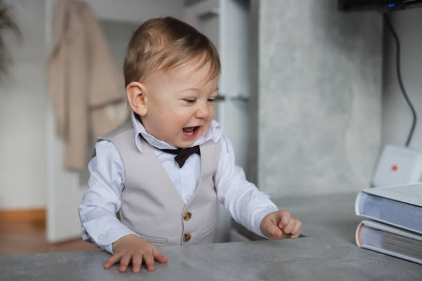 Portrait of beautiful and playful one year old baby boy.