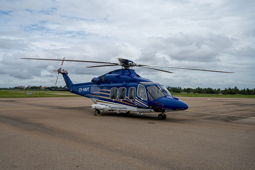 April 5, 2023: Nampula, Mozambique.  Augusta Westland / Leonardo AW139 Helicopter registration C9-HMT parked on the apron of Nampula airport in Mozambique.