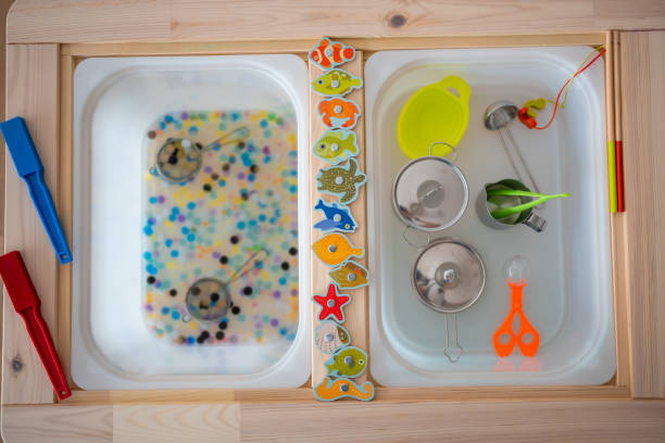 Sensory water beads, hydrogel balls. Sensory development and experiences, themed activities with children, fine motor skills development
