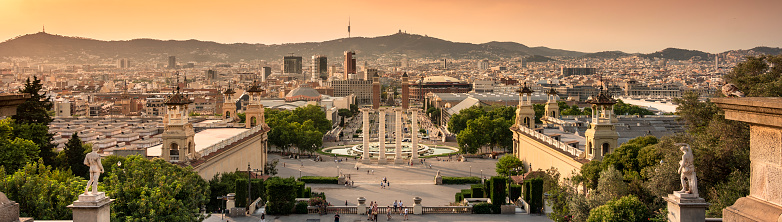 Barcelona, Spain - June 17, 2022:  City skyline view from the top of Montjuïc and the grounds of the National Palace Art Museum in Barcelona Catalonia Spain
