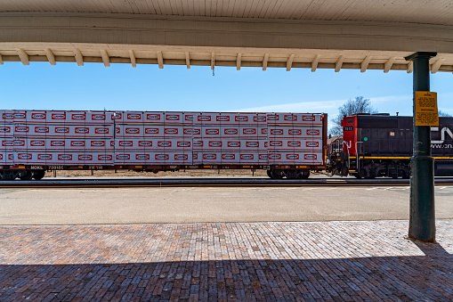 Stratford, Canada - April 2, 2023: A CN train is entering the railway station. The view of train station, Stratford, Canada.