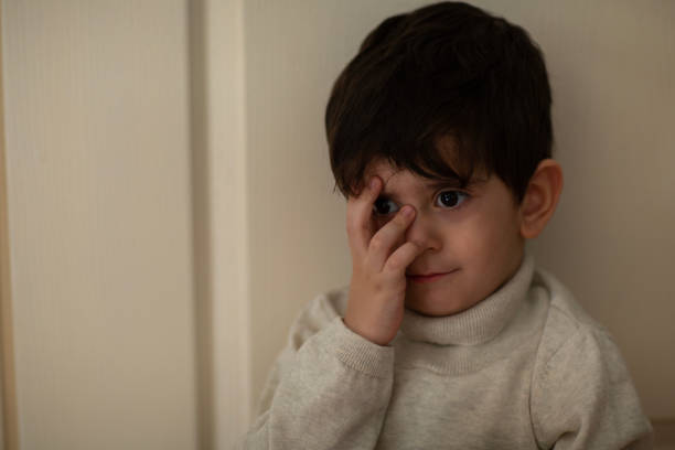 istock Portrait of little boy lookingat camera 1488433129