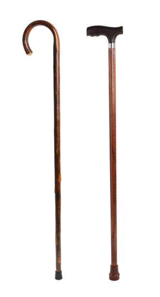 istock Elegant wooden walking canes on white background 1488434040