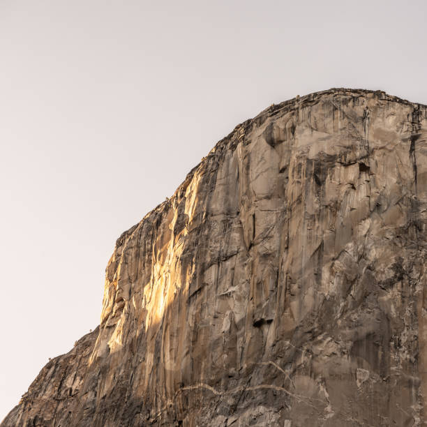 istock Close Up of The Flat Wall On Half Dome Catching Evening Sun Light 1488434342