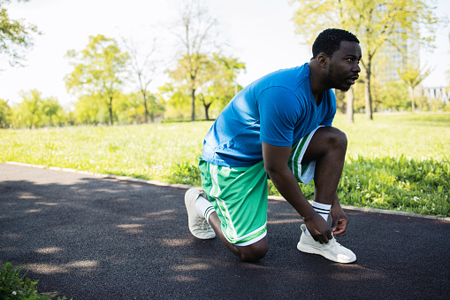 Young man spends his free time exercising outdoors