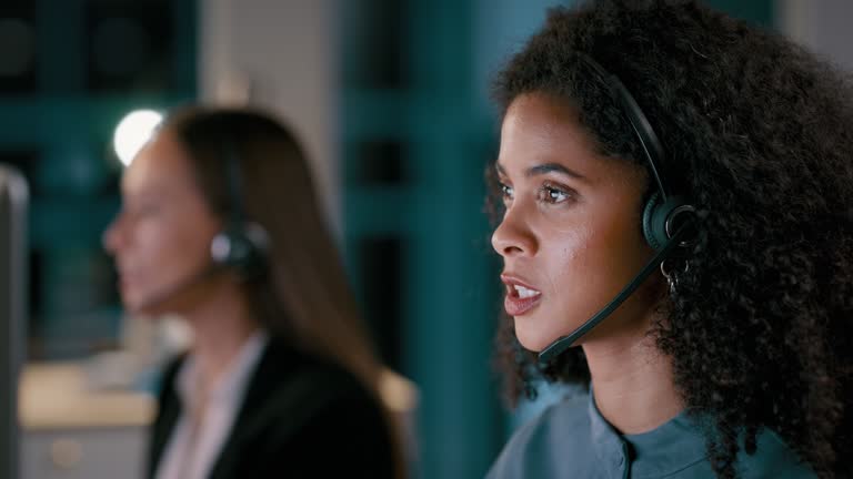 Night, workers and women with customer service, telemarketing and explain protection system. Female consultants, employees and staff with headset, communication and tech support with call center