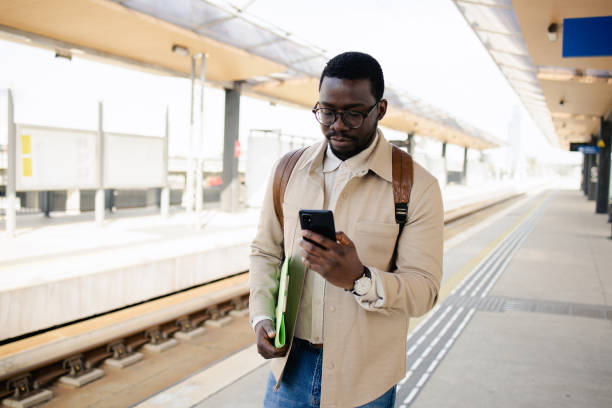 istock Young tourist is waiting for a train 1488438529
